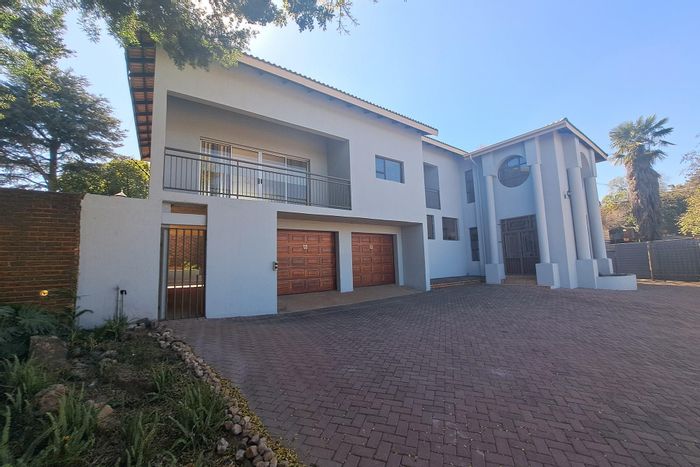 For Sale: House in Waterkloof Ridge with pool, office suite, and security features.