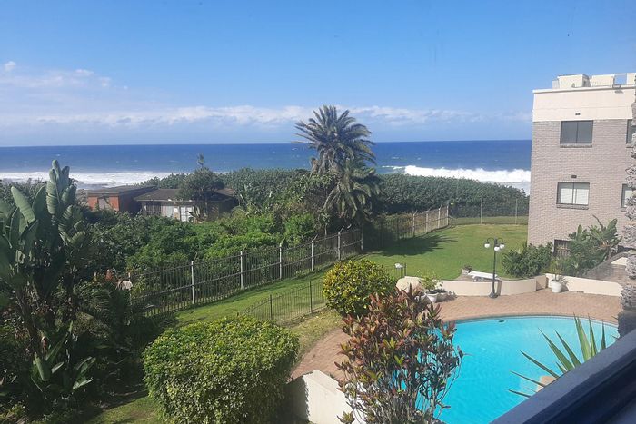 Beachfront apartment in Uvongo for sale: 3 bedrooms, pool, pet-friendly, sea views.