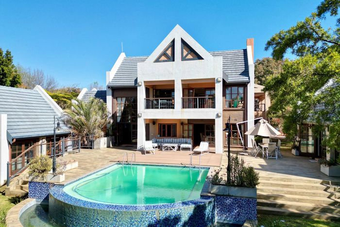 For Sale: 5-Bedroom House in Mooikloof Equestrian Estate with Tennis Court and Pool.