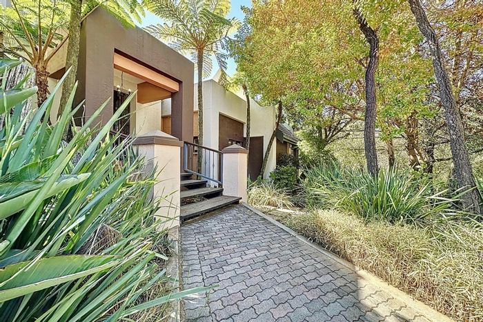 For Sale: House in Mooikloof Equestrian Estate with tennis court, pool, and stables.
