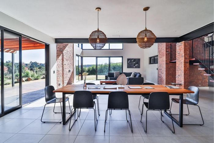 For Sale: 4-Bedroom House in Hilton Central with eco-friendly features and expansive views.