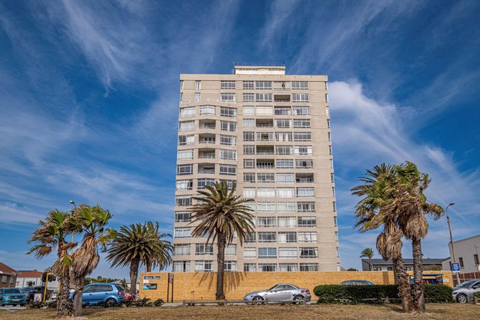 Ocean-view apartment in Summerstrand with secure parking and beachfront access. For Sale.