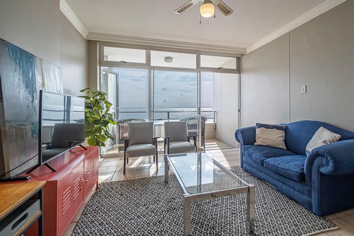 Ocean-view apartment in Summerstrand with secure parking and beachfront access. For Sale.