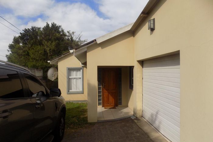 For Sale: House in Cambridge West with flatlet, spacious bedrooms, and garage.