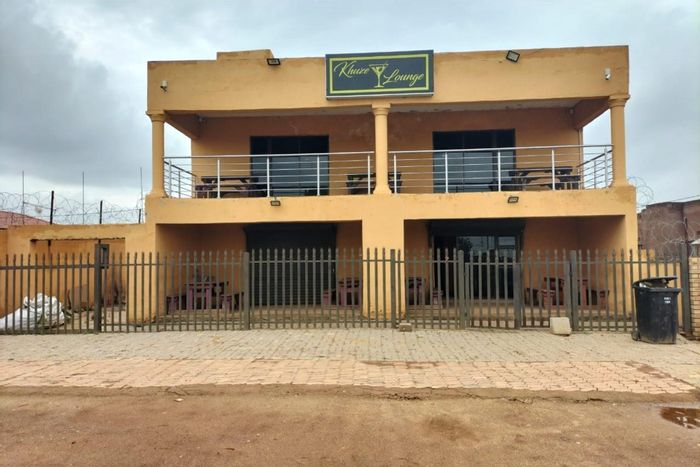 For Sale: Retail property in Orange Farm with 3 floors, kitchen, bar, and parking.