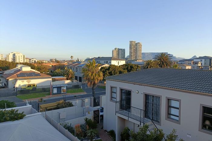 Beachfront Apartment To Rent: 2 bedrooms, pool, braai area, and secure parking.