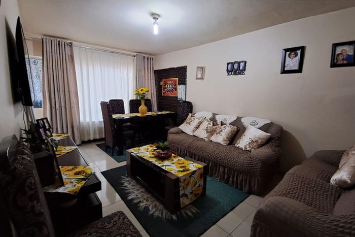 For Sale: 2-Bedroom Apartment in South Beach with balcony, near amenities and transport.