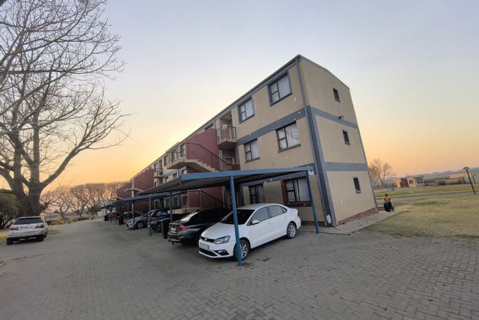 2-Bedroom Apartment For Sale in Madadeni J, gated estate with essential amenities nearby.