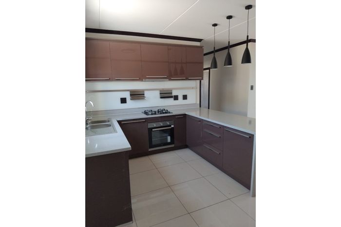 2-Bedroom Apartment To Rent in Blue Hills with clubhouse, pool, and secure access.