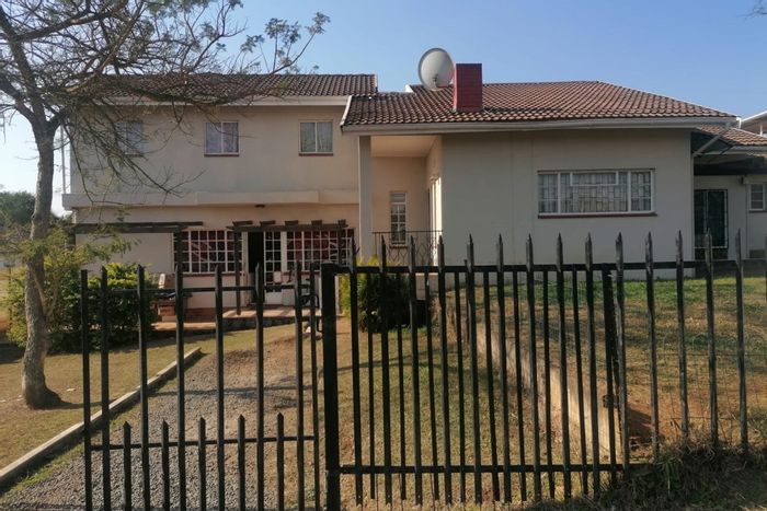 For Sale: Spacious 5-bedroom house in Howick West with garages and scenic views.