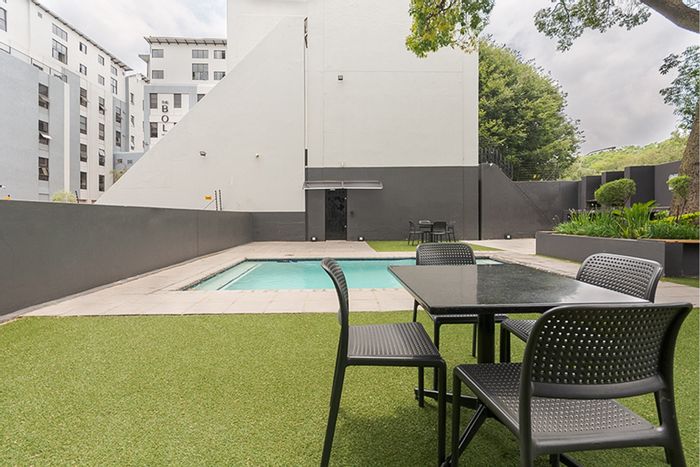 2 Bed, 1 Bath Apartment To Rent in Rosebank with open-plan living and kitchen.