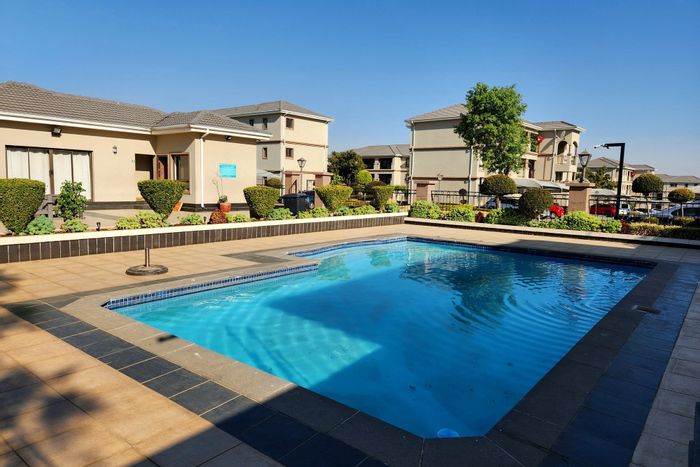 For Sale: 2-Bedroom Apartment in Halfway Gardens with Pool, Clubhouse, and Balcony.