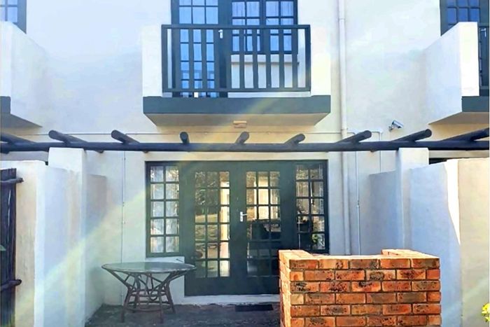For Sale: West Beach Townhouse with 2 bedrooms, courtyard, and Airbnb potential.
