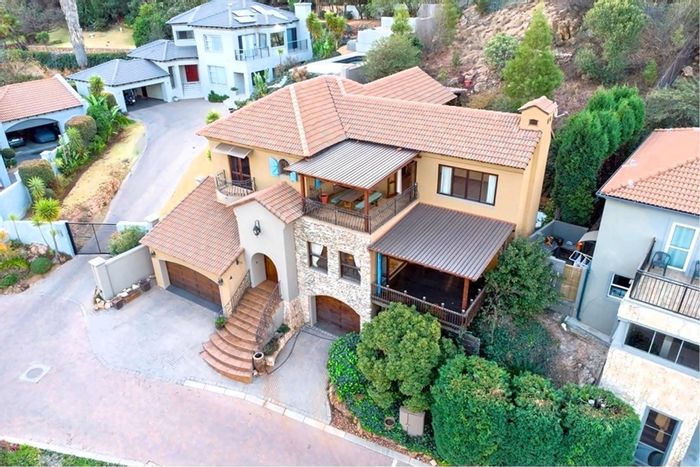 For Sale: House in Constantia Kloof with three en-suite bedrooms, entertainment areas, and wine cellar.