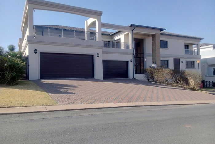 For Sale: House in Blue Valley Golf Estate with pool, cinema, and spacious garage.