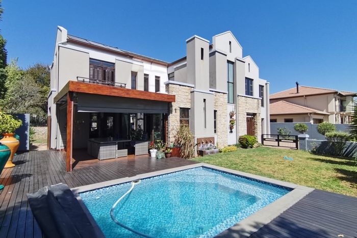 House for Sale in Greenstone Hill: Solar pool, generator, open-plan living, secure estate.