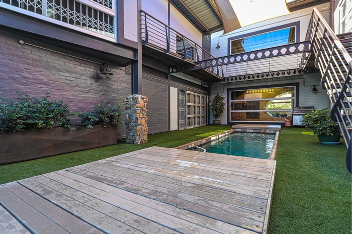 Rynfield House For Sale: Four garages, hidden pool, versatile entertainment spaces.