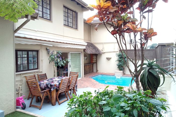 For Sale: Townhouse in Musgrave with pool, garden, and secure parking.