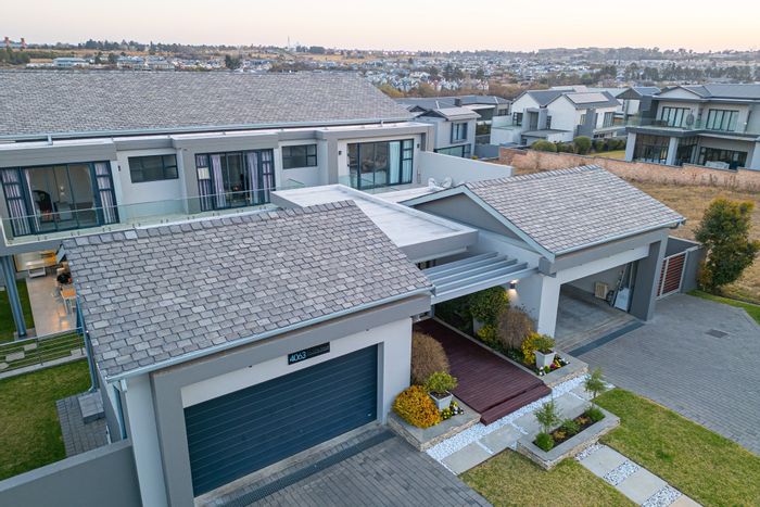 For Sale: House in Waterfall Country Estate with pool, dual kitchens, and off-grid living.