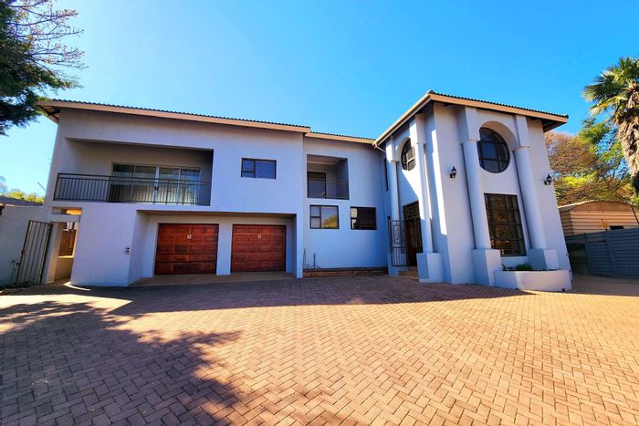 For Sale: House in Waterkloof Ridge with pool, offices, and spacious living areas.