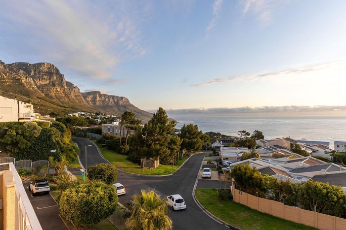 Camps Bay Apartment For Sale: Ocean views, private terrace, secure garage.