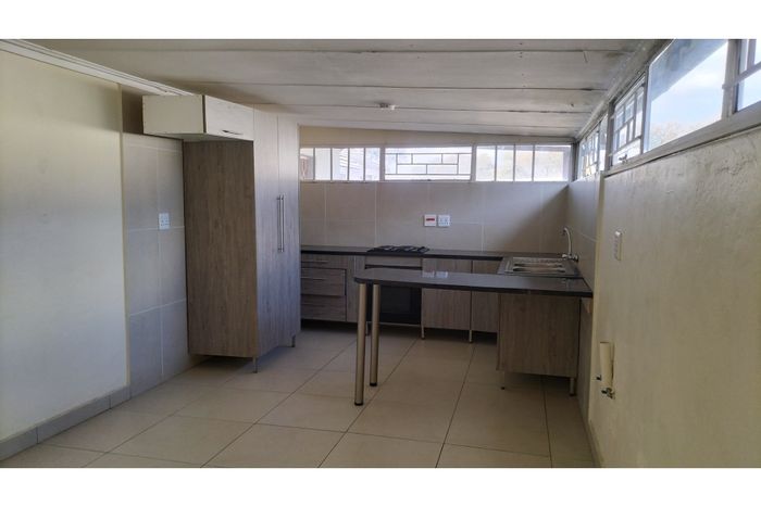 1-Bedroom Apartment To Rent in Brits Central with security, parking, and convenience.