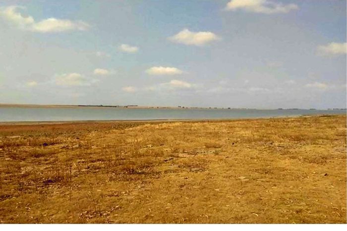 For Sale: Farm at Vaaldam Sh with direct water access and expansive land.