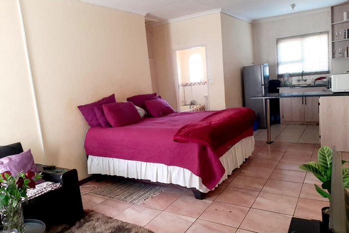 To Rent: Apartment in Mmabatho with secure access, fitted kitchen, and privacy features.