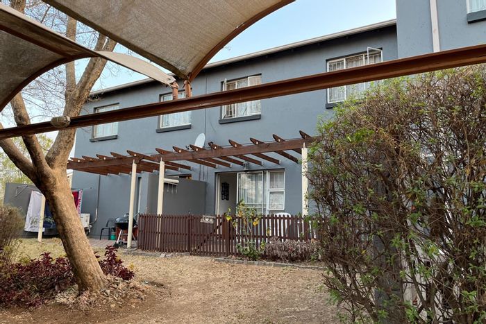 For Sale: Townhouse in Greenstone Hill with garden, pool, and 24-hour security.