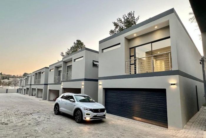 Bryanston Townhouse For Sale: 3 en-suite bedrooms, private garden, 24/7 security.