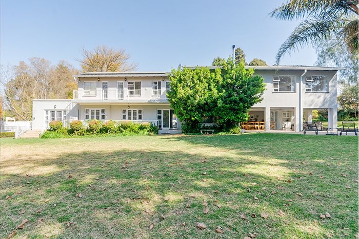 Woodmead House For Sale: 6 bedrooms, gym, garden, and triple garage.