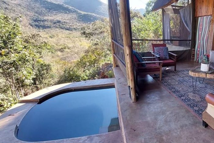 Lodge for Sale in Thabazimbi Rural: Eco-friendly, game reserve access, commercial rights.