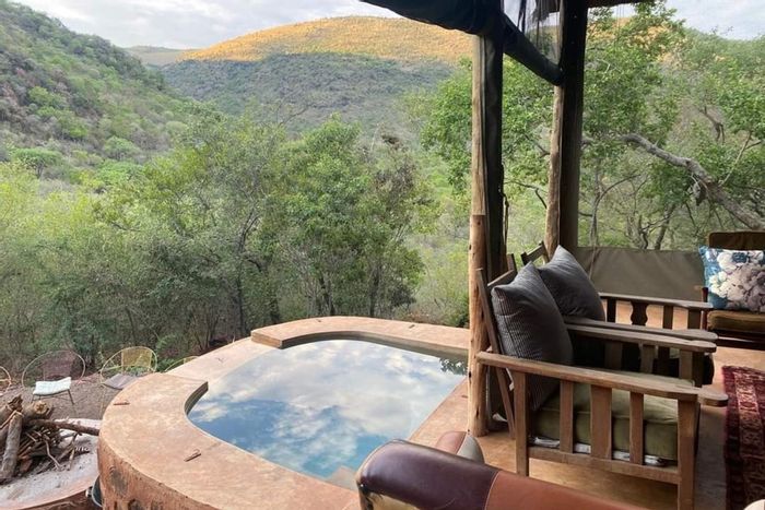 Lodge for Sale in Thabazimbi Rural: Eco-friendly, game reserve access, commercial rights included.