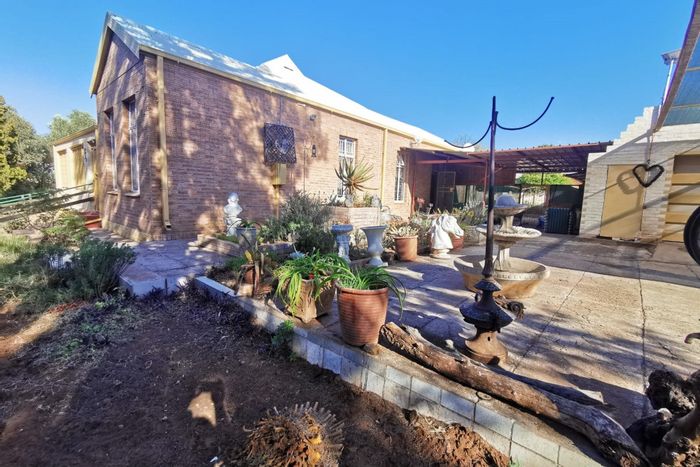 Beaconsfield House For Sale: Four bedrooms, tenant-occupied, outdoor braai area, ample parking.