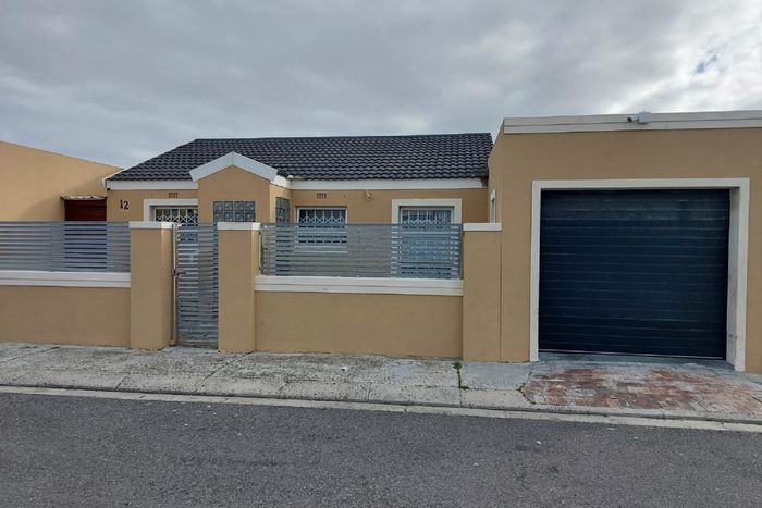 For Sale: House in Strandfontein with 2 bedrooms, garage, and outdoor patio.