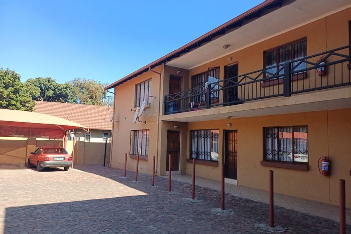 Two-Bedroom Apartment For Sale in Brits Central with Pool, Gym, and Security.
