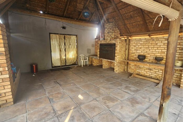 For Sale: Spacious 4-bedroom house in Brakpan Central with pool, garages, and entertainment area.