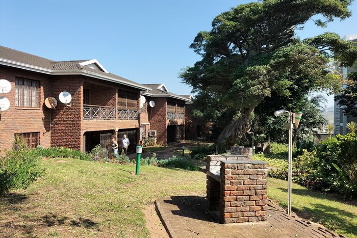 For Sale: Ground floor apartment in Scottburgh Central with pool, garage, and garden.