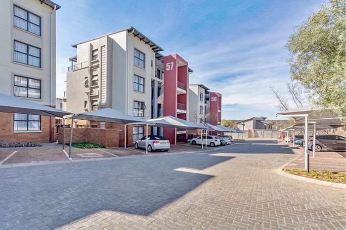 For Sale: Apartment in Fourways with gym, pool, clubhouse, and private balcony.