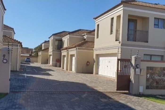 Wavecrest Townhouse For Sale: 2 bedrooms, garage, outdoor braai, efficient utilities.