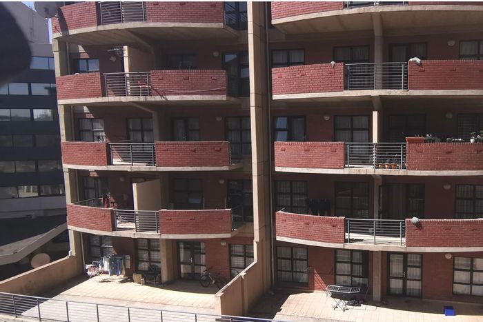 For Sale: Apartment in Braamfontein Werf with two bedrooms, balcony, and ideal location.