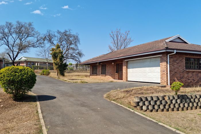 For Sale: Hayfields Townhouse with 3 bedrooms, double garage, and community hall.