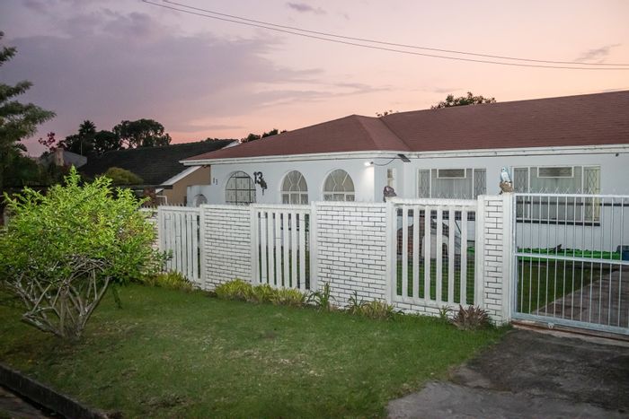 For Sale: Spacious 4-bedroom house in Cambridge with double garage and large yard.