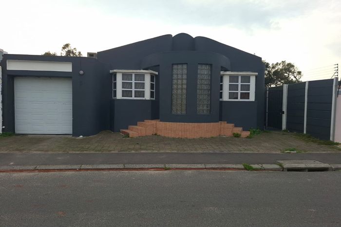 House For Sale in Pelican Park: 2 beds, garage, braai pit, tenant-occupied.