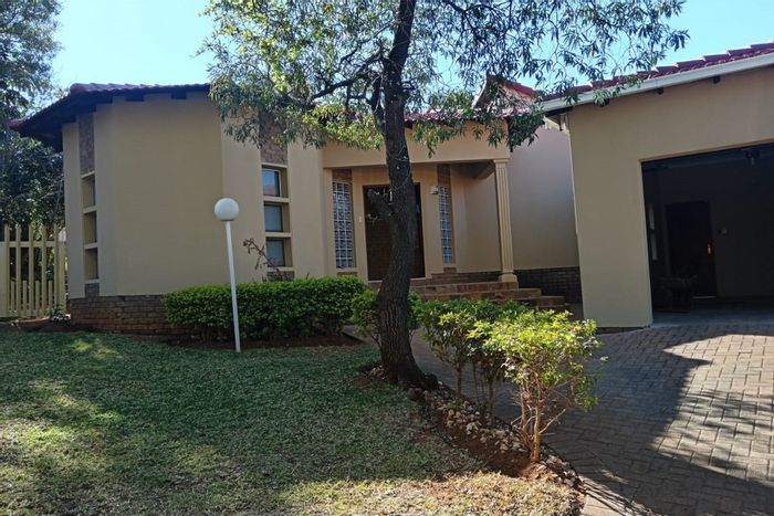 For Sale: House in Safari Gardens with entertainment area, flat, and double garage.