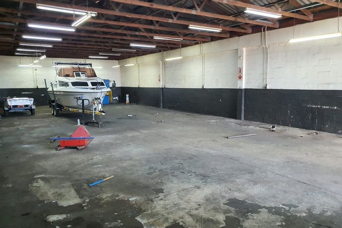 To Rent: 300m2 Industrial Warehouse in North End with secure access and offices.