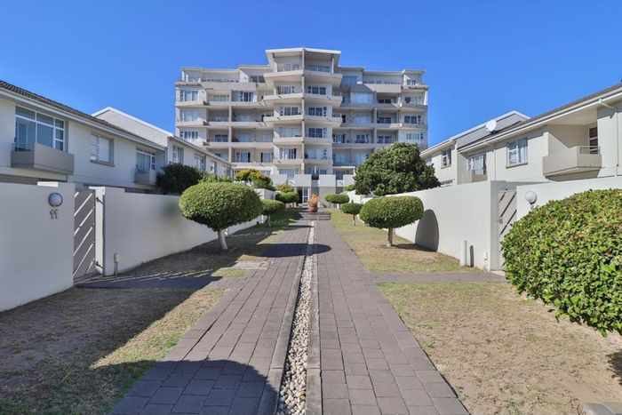 Humewood Apartment For Sale: 2 bedrooms, wrap-around balcony, ocean views, secure garage.