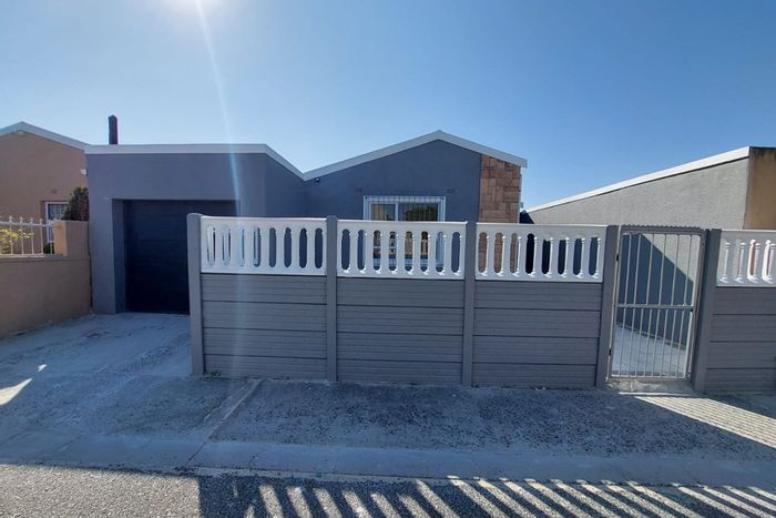 House For Sale in Strandfontein Village: 4 bedrooms, granny flat, secure garage.