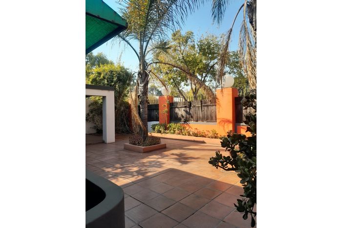 Versatile 4-bedroom house in Pretoria West with flatlet and large yard. For Sale.