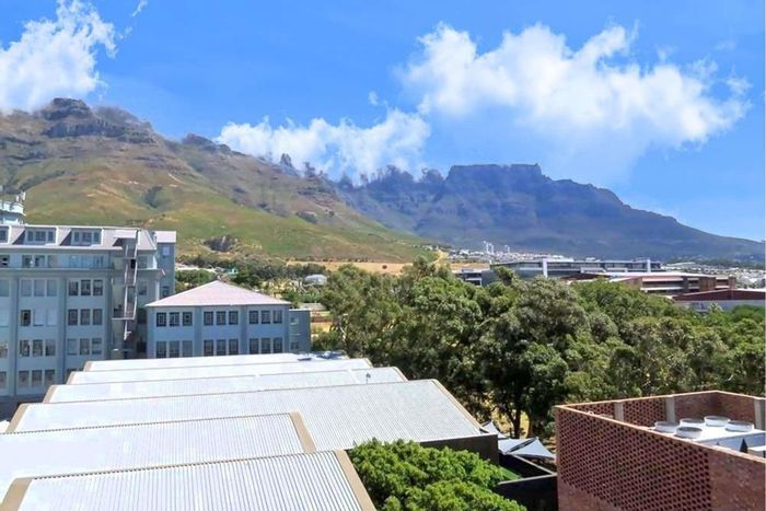 Furnished apartment in Woodstock with Table Mountain views and secure parking, To Rent.